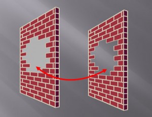 The shape on the right leverages the slide background fill effect to simulate a cut-out effect in the wall. 